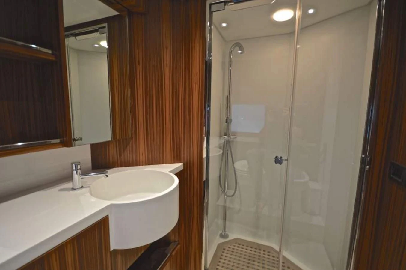 a bathroom with a glass shower aboard TAURUS Yacht for Sale
