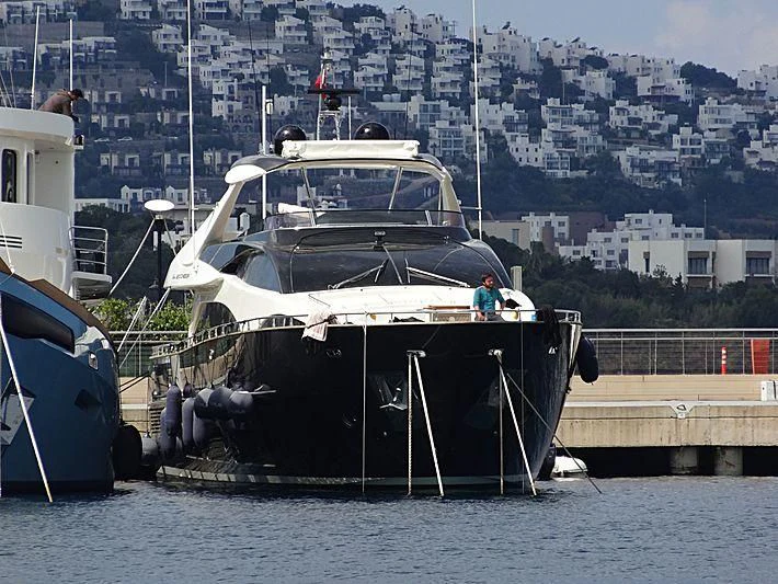 a couple of boats are parked at a dock aboard TAURUS Yacht for Sale