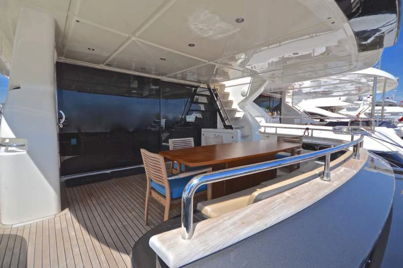 a room with a table and chairs aboard TAURUS Yacht for Sale