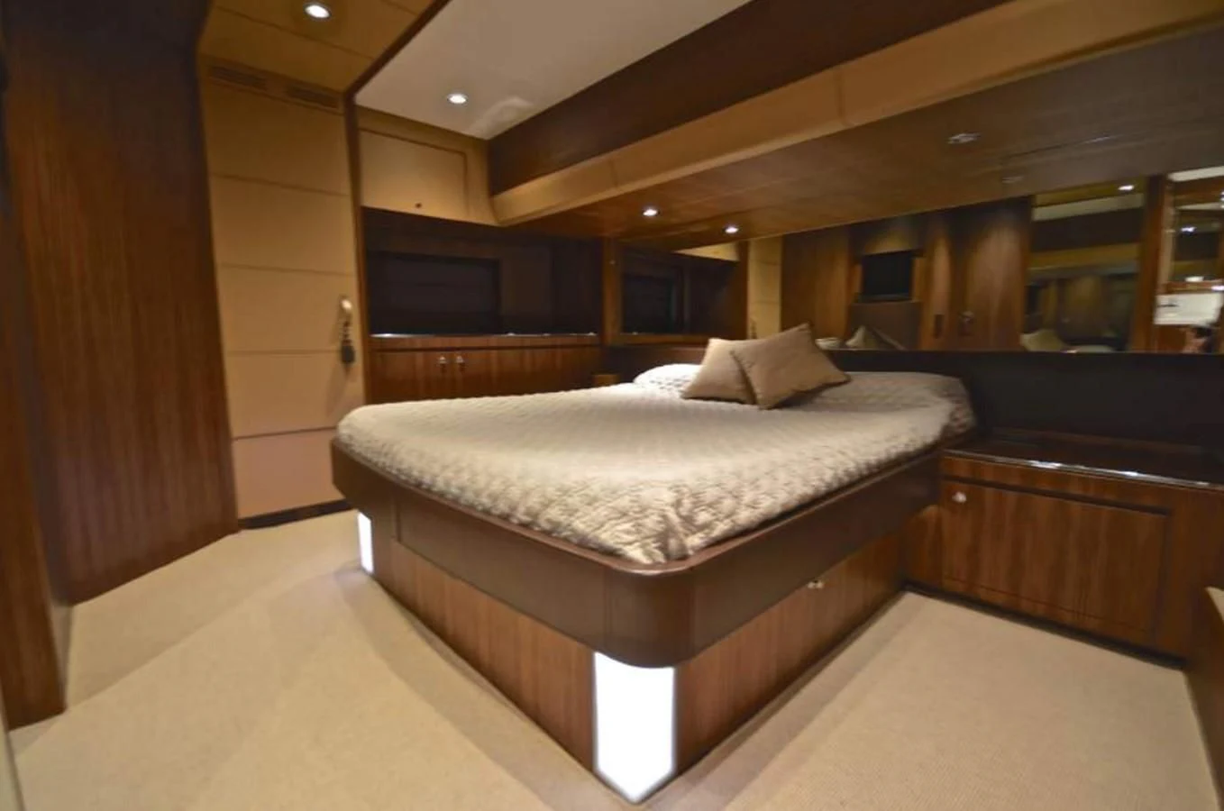 a large bed in a room aboard TAURUS Yacht for Sale