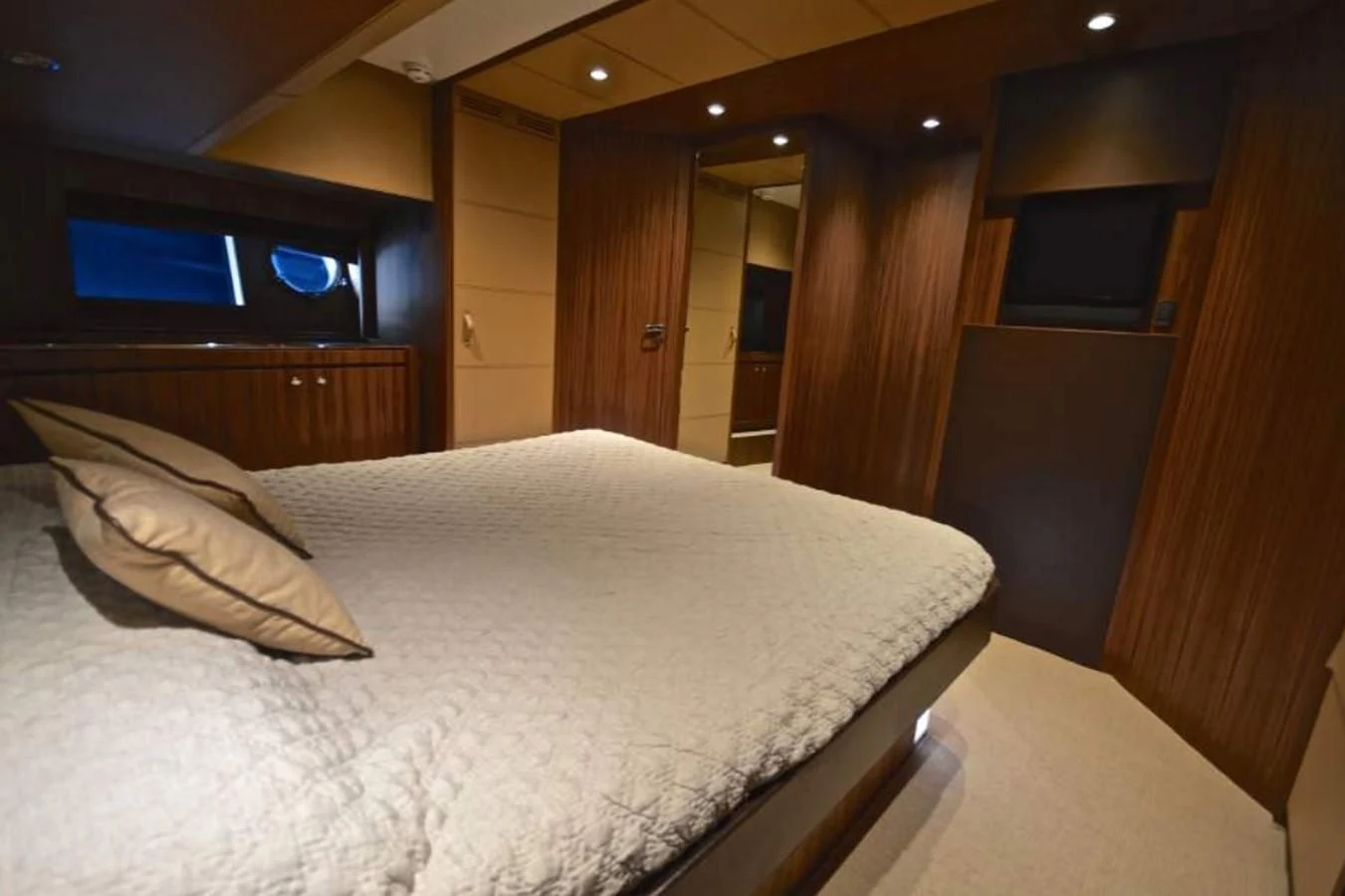 a bed in a room aboard TAURUS Yacht for Sale