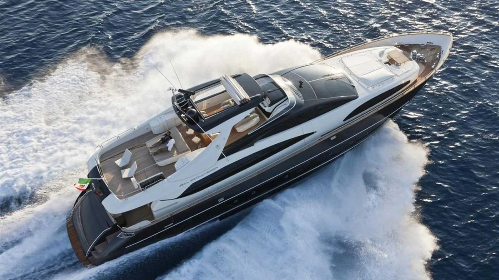 a car on a water body aboard TAURUS Yacht for Sale