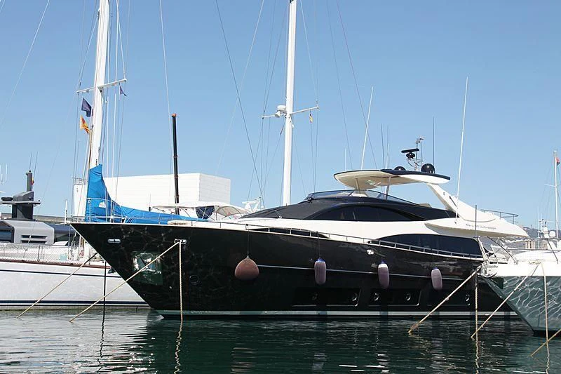 a large boat docked aboard TAURUS Yacht for Sale