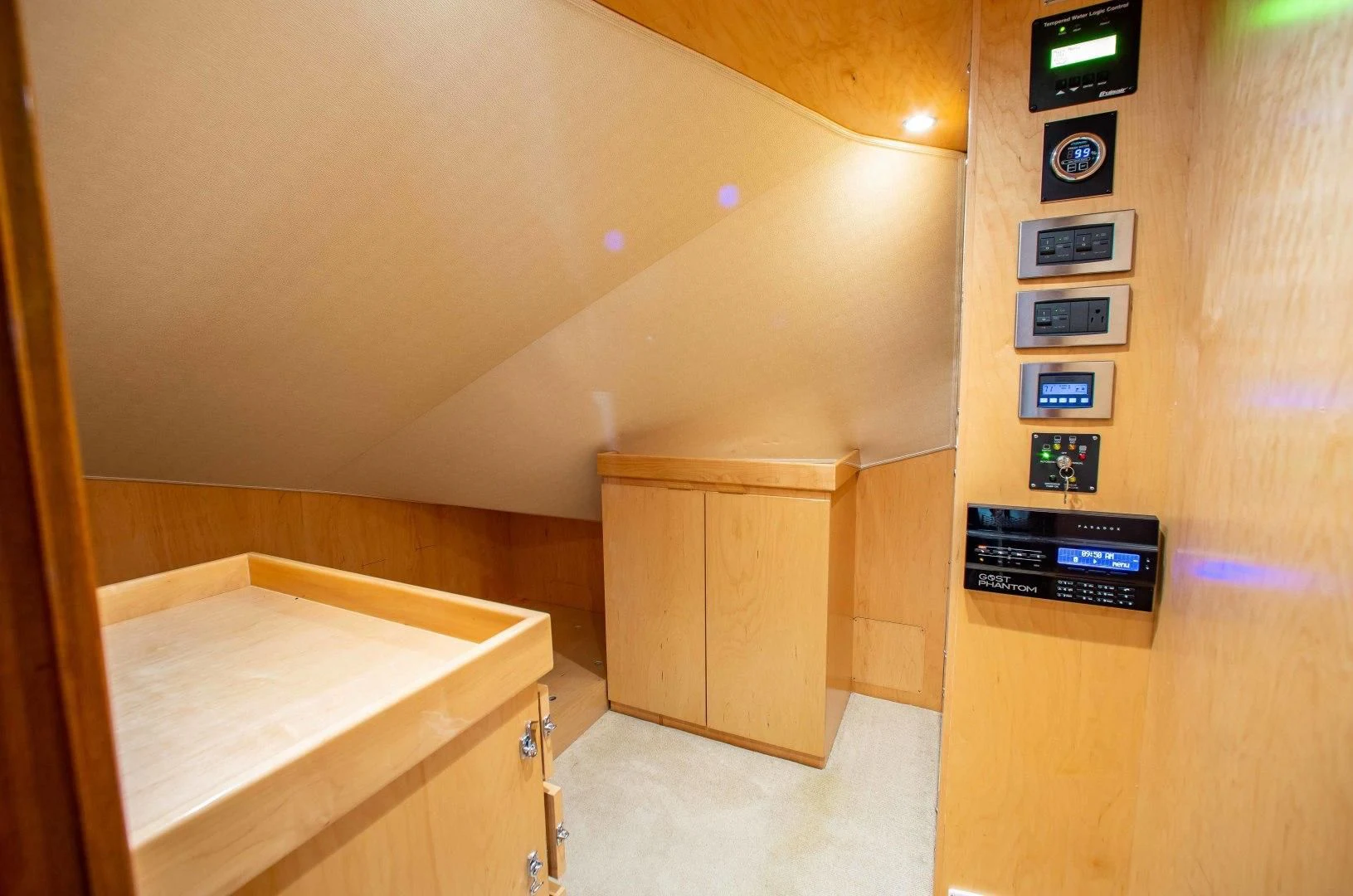 a room with a cabinet and a computer aboard BIMINI BABE Yacht for Sale