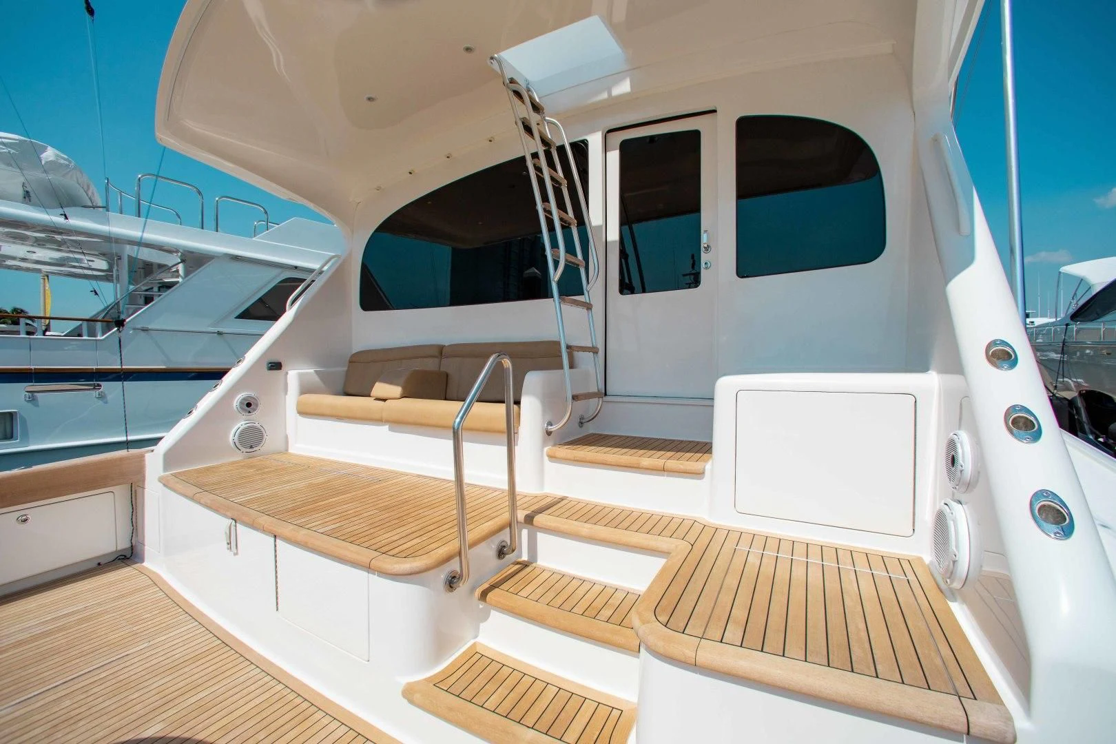 a boat with a deck aboard BIMINI BABE Yacht for Sale
