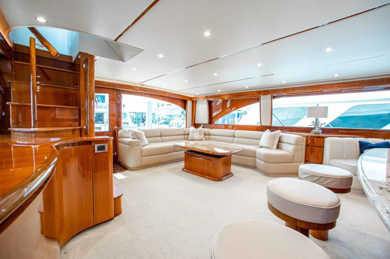 a living room with a large window aboard BIMINI BABE Yacht for Sale