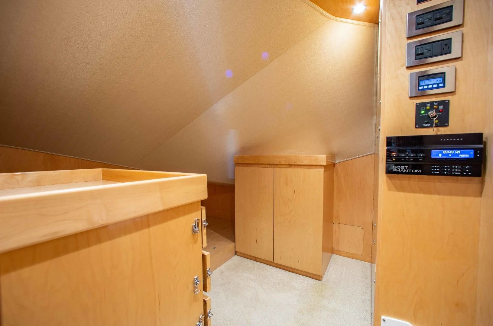 a room with a cabinet and a computer aboard BIMINI BABE Yacht for Sale