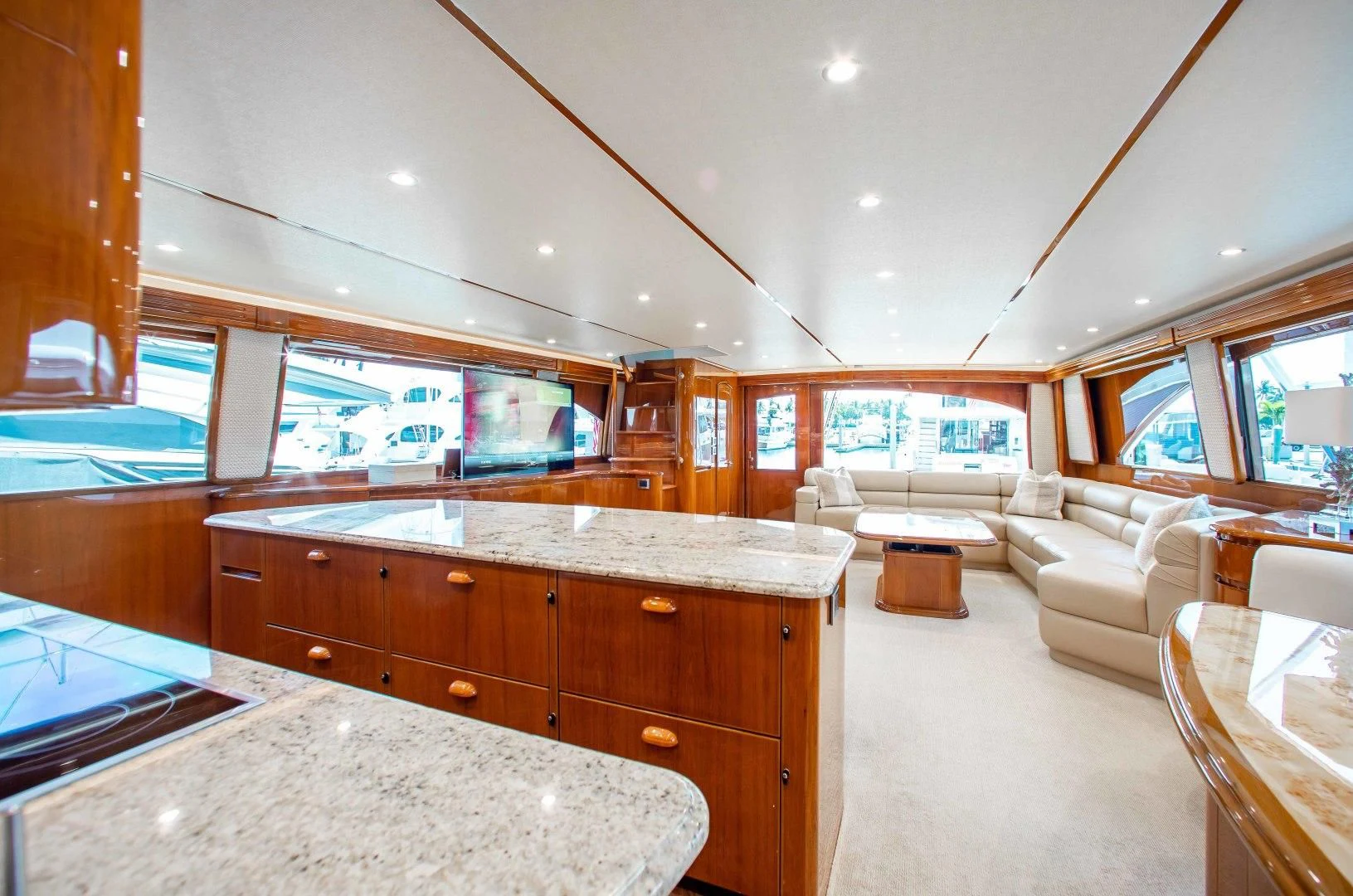 a large kitchen with a large island aboard BIMINI BABE Yacht for Sale