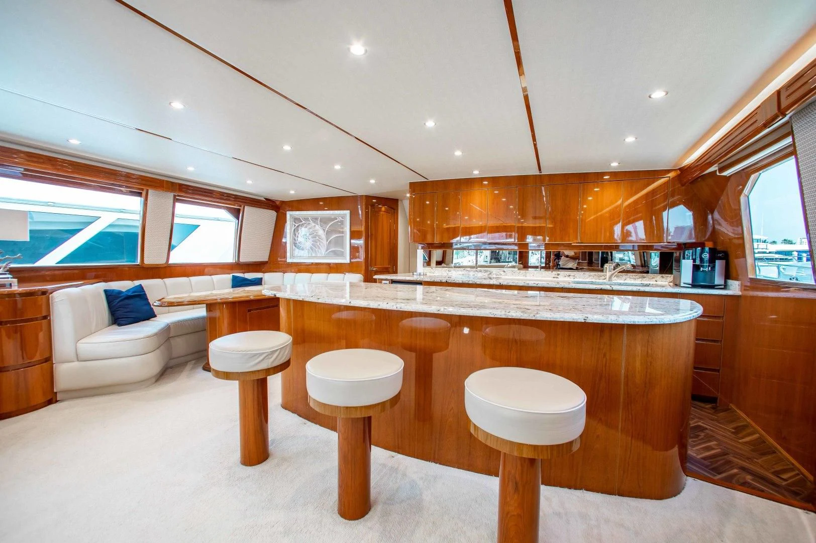 a large kitchen with a large island aboard BIMINI BABE Yacht for Sale