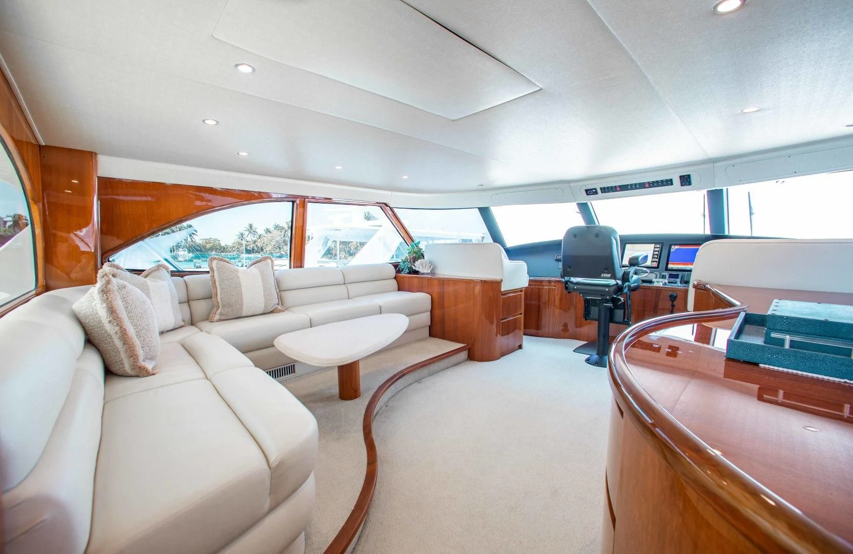 a room with a couch and a chair aboard BIMINI BABE Yacht for Sale