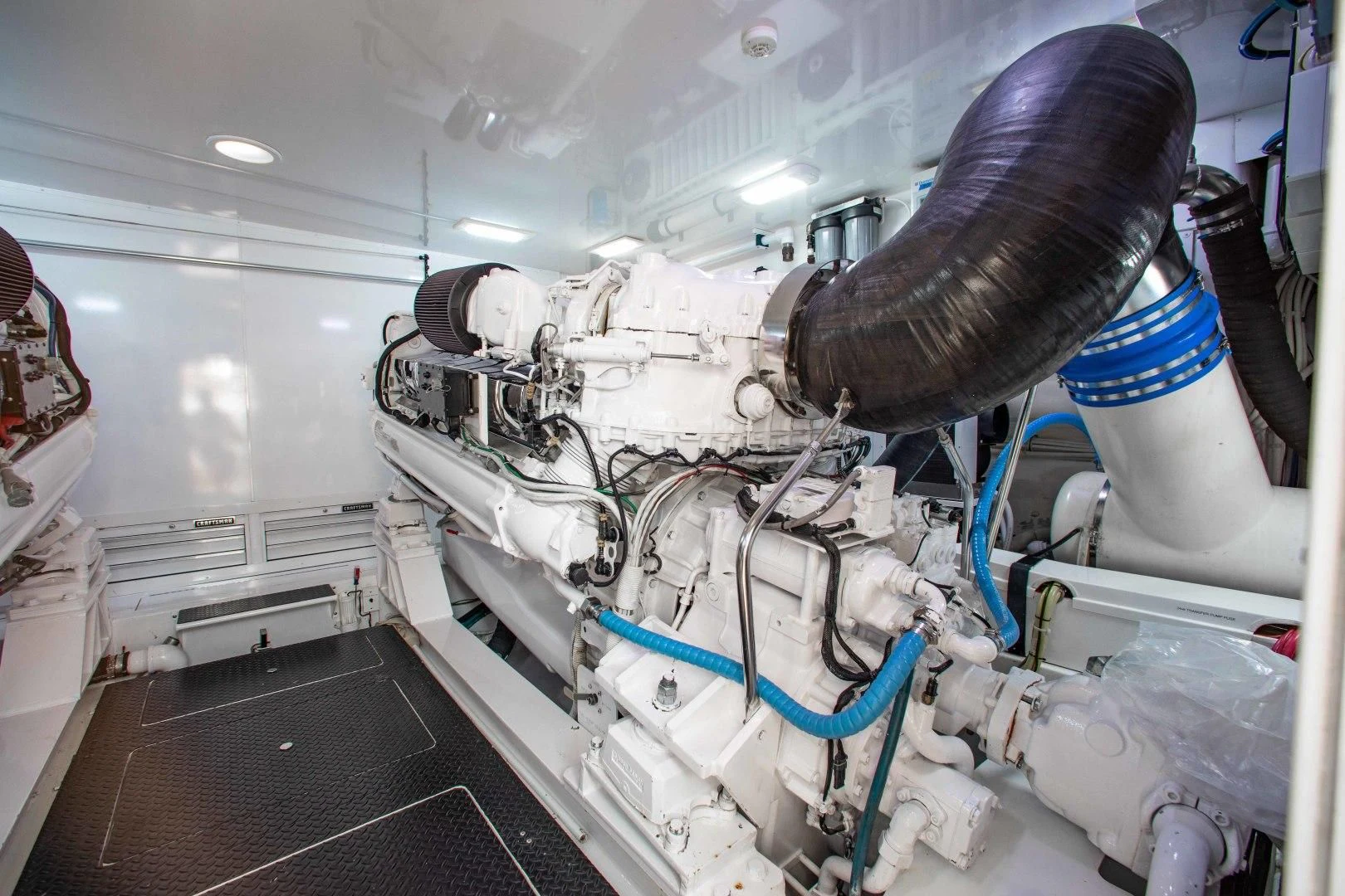 a large white machine with blue cables aboard BIMINI BABE Yacht for Sale