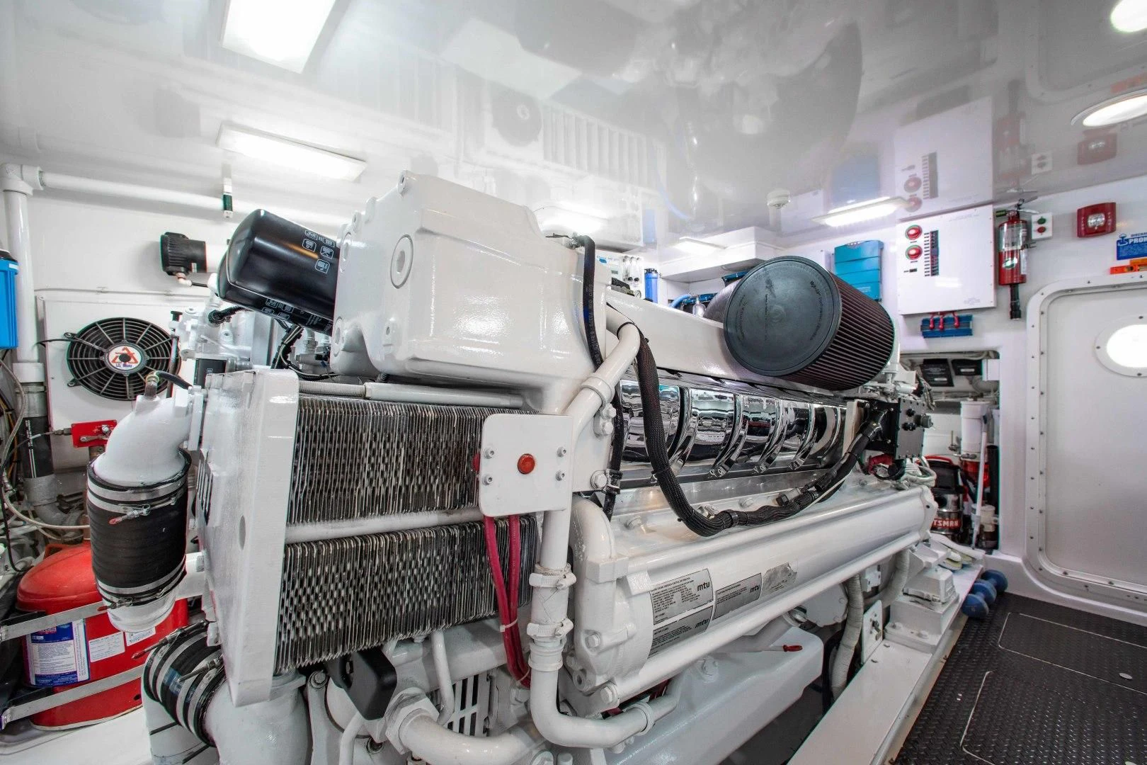 a white machine with a large piece of equipment on it aboard BIMINI BABE Yacht for Sale