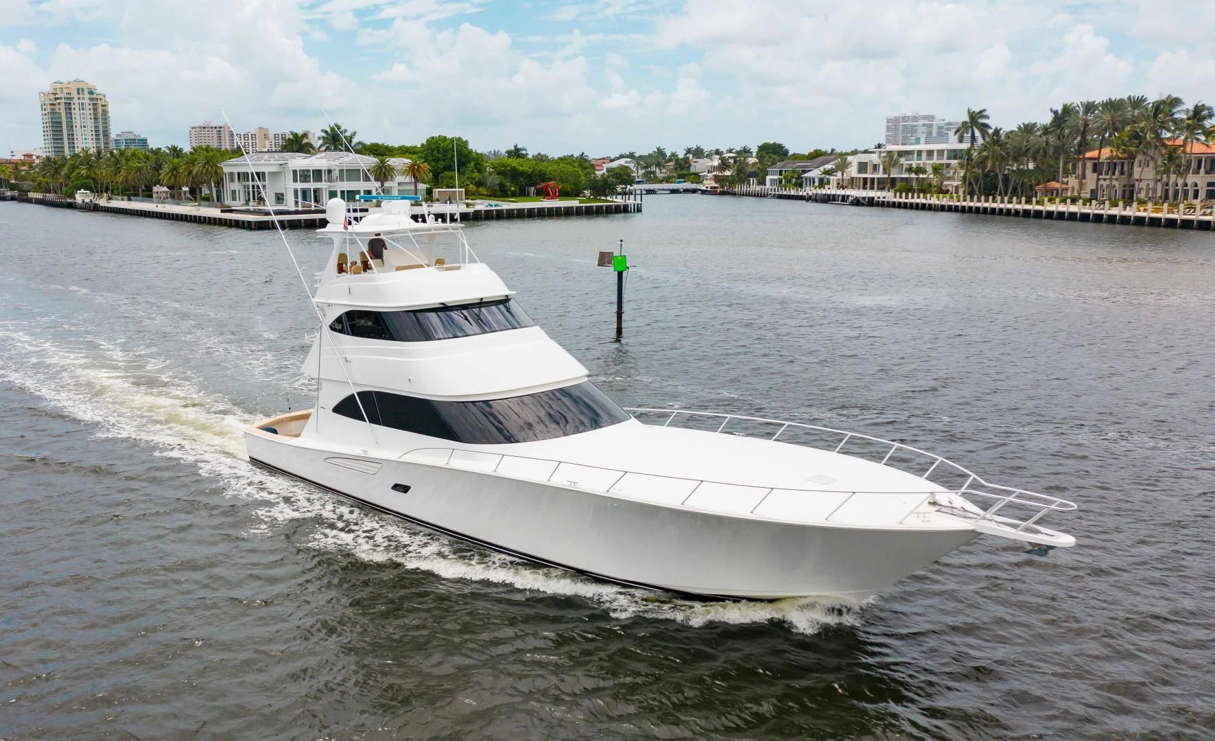 a white boat on the water aboard BIMINI BABE Yacht for Sale