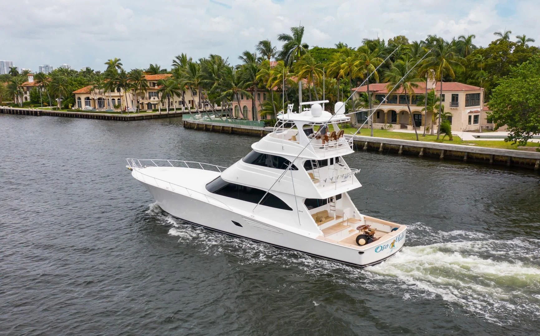 a white boat on water aboard BIMINI BABE Yacht for Sale