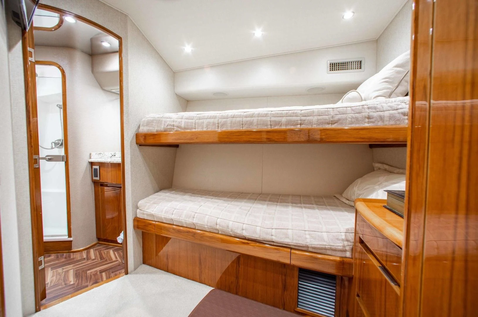 a room with two beds aboard BIMINI BABE Yacht for Sale