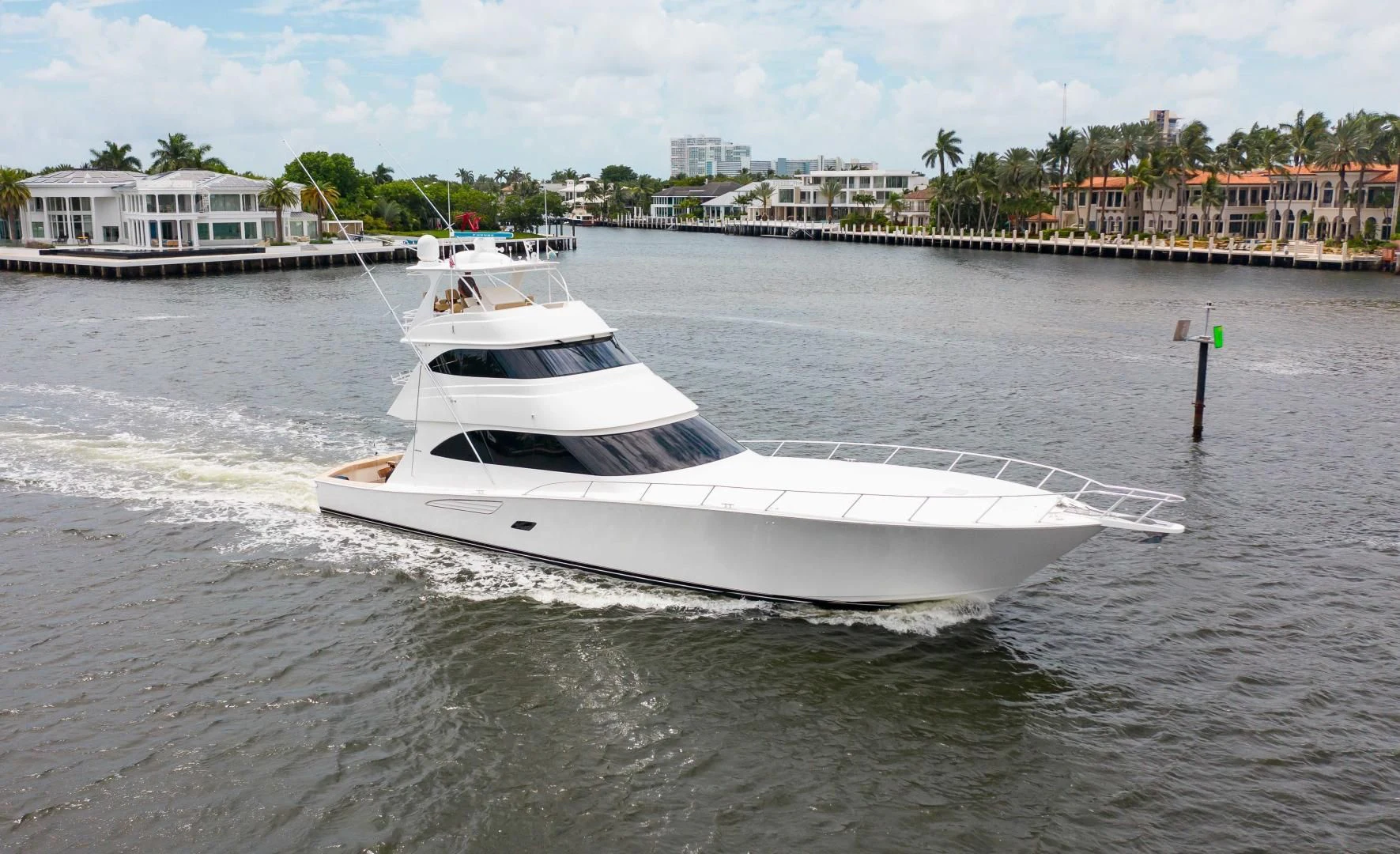 a white boat in the water aboard BIMINI BABE Yacht for Sale