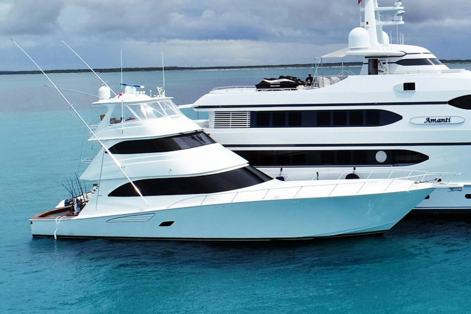 a white yacht in the water aboard BIMINI BABE Yacht for Sale