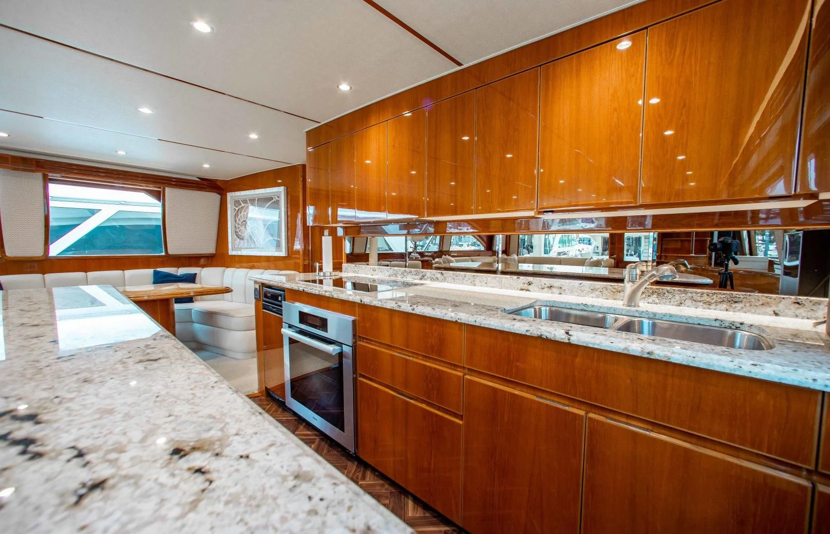 a kitchen with marble counters aboard BIMINI BABE Yacht for Sale