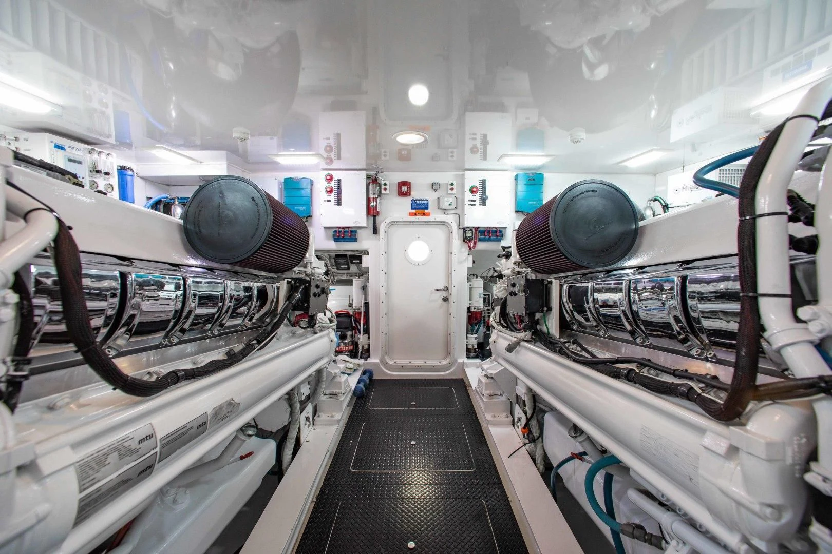 a room with several machines aboard BIMINI BABE Yacht for Sale
