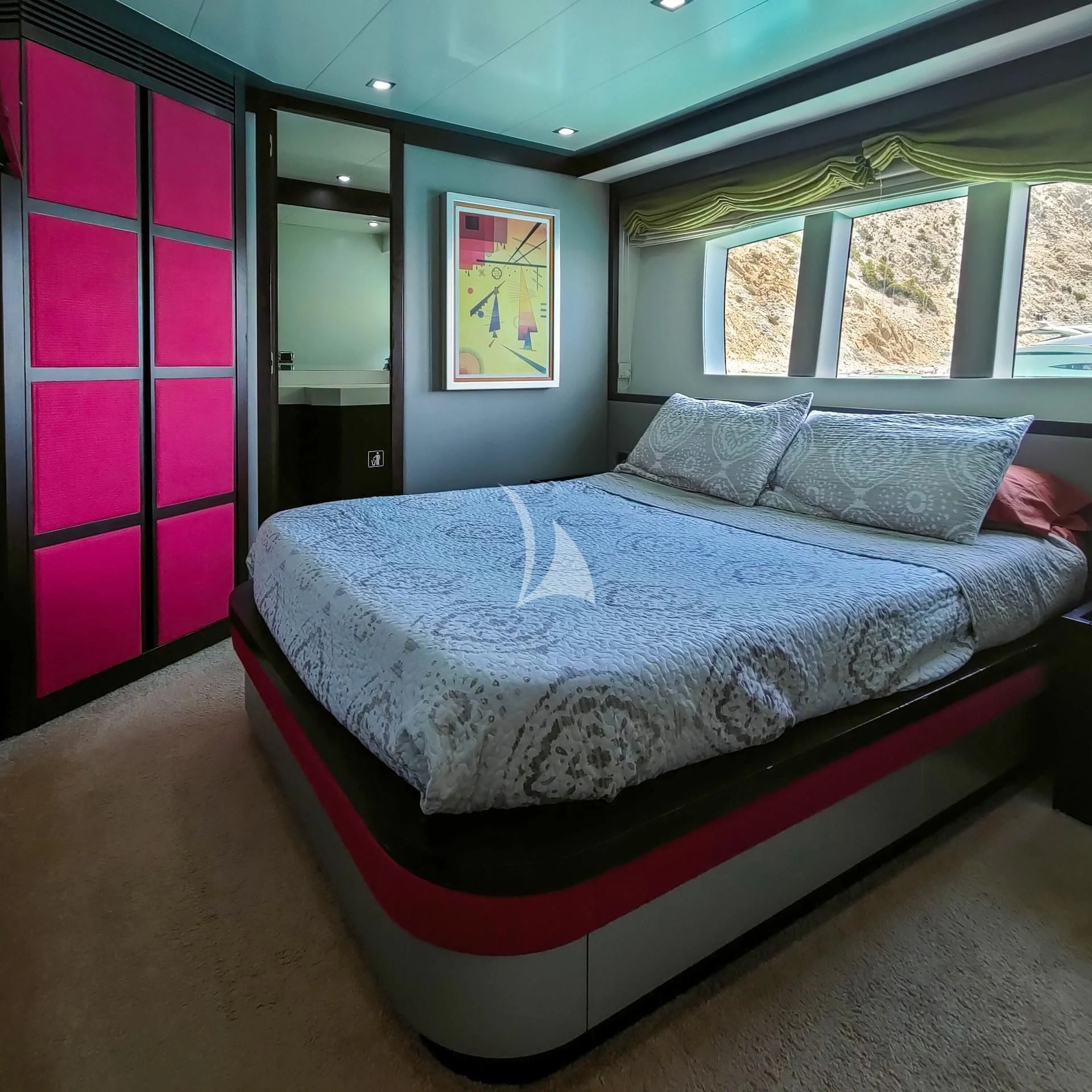 a bed in a room aboard GEMINIS Yacht for Sale