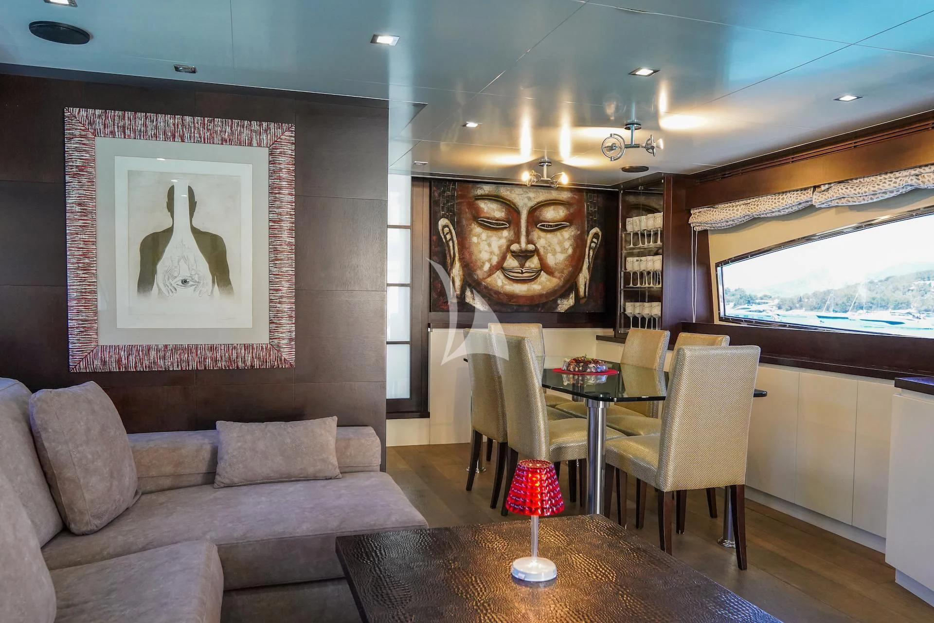 a living room with a couch and a table aboard GEMINIS Yacht for Sale
