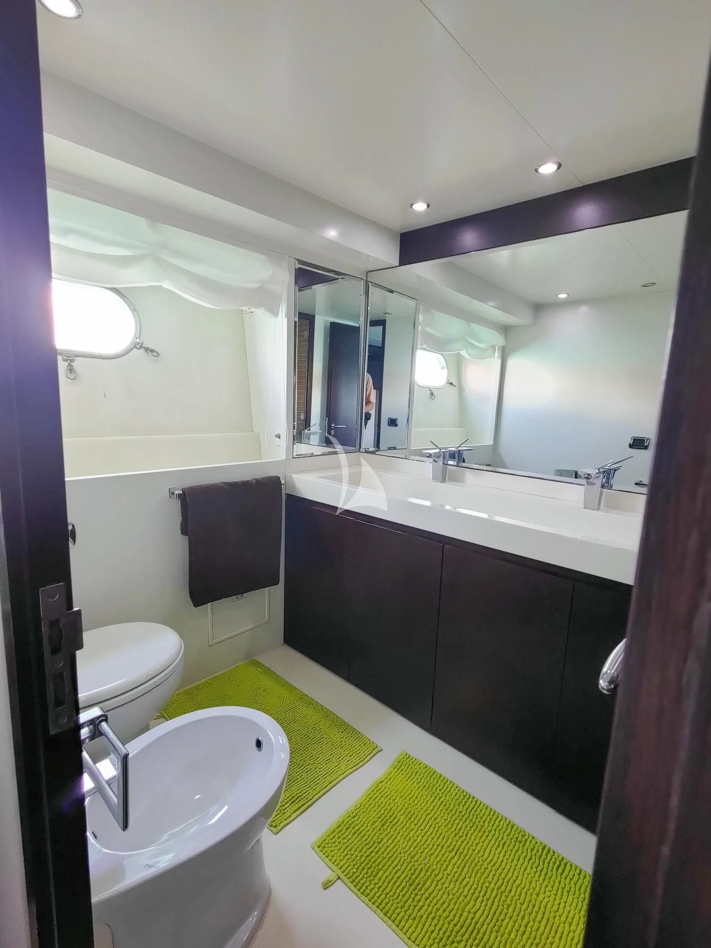 a bathroom with a tub sink and toilet aboard GEMINIS Yacht for Sale
