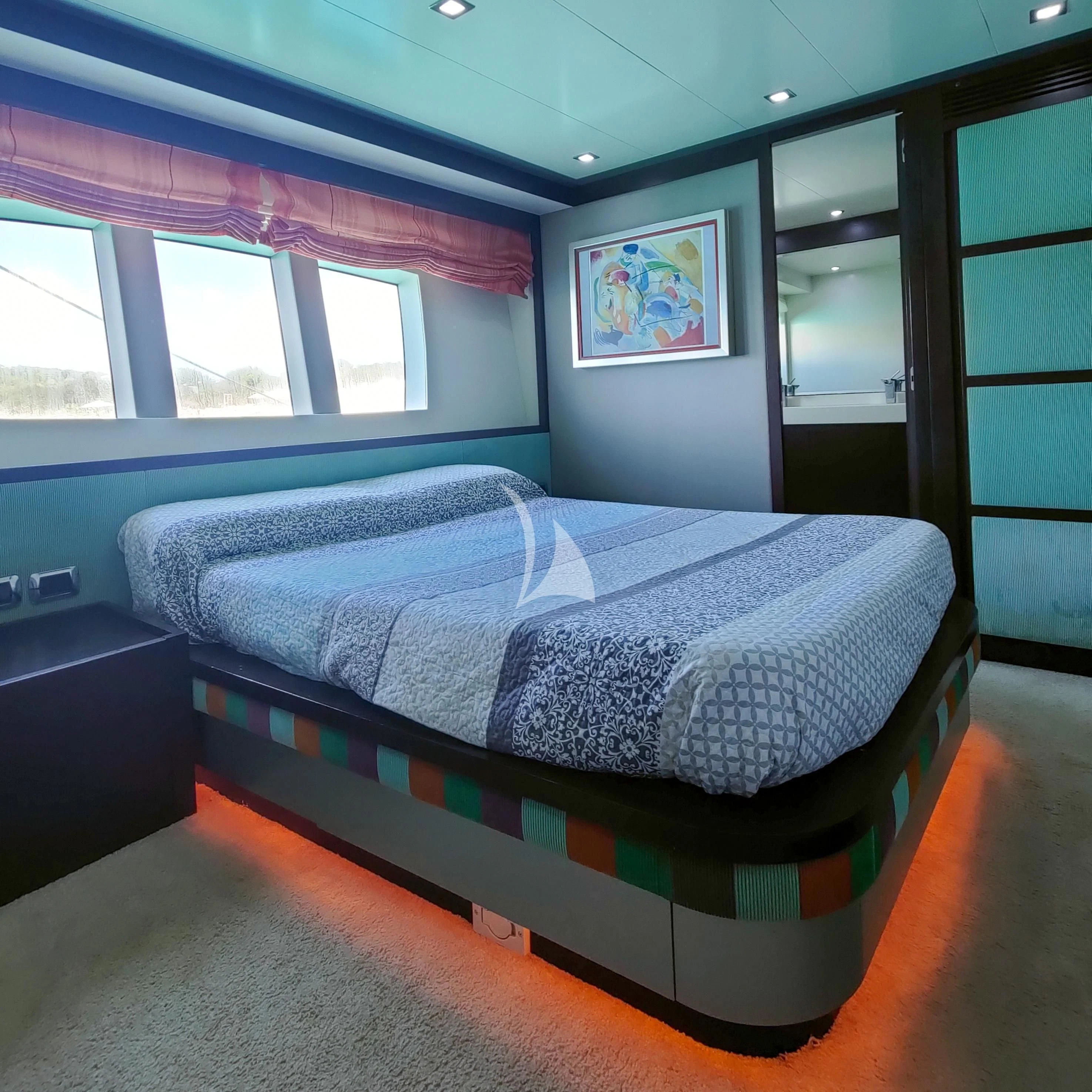 a bed in a room aboard GEMINIS Yacht for Sale