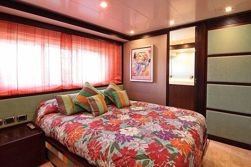 a bed in a room aboard GEMINIS Yacht for Sale