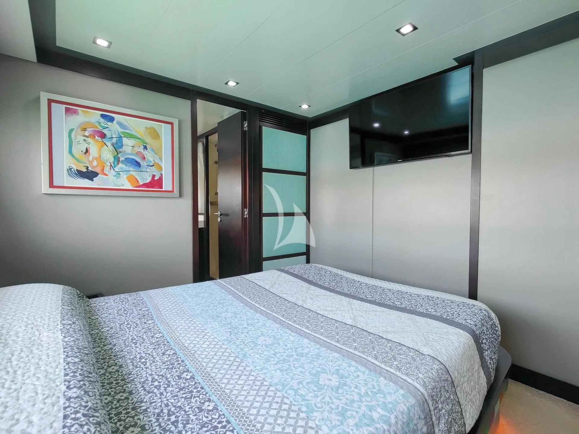 a bed in a room aboard GEMINIS Yacht for Sale