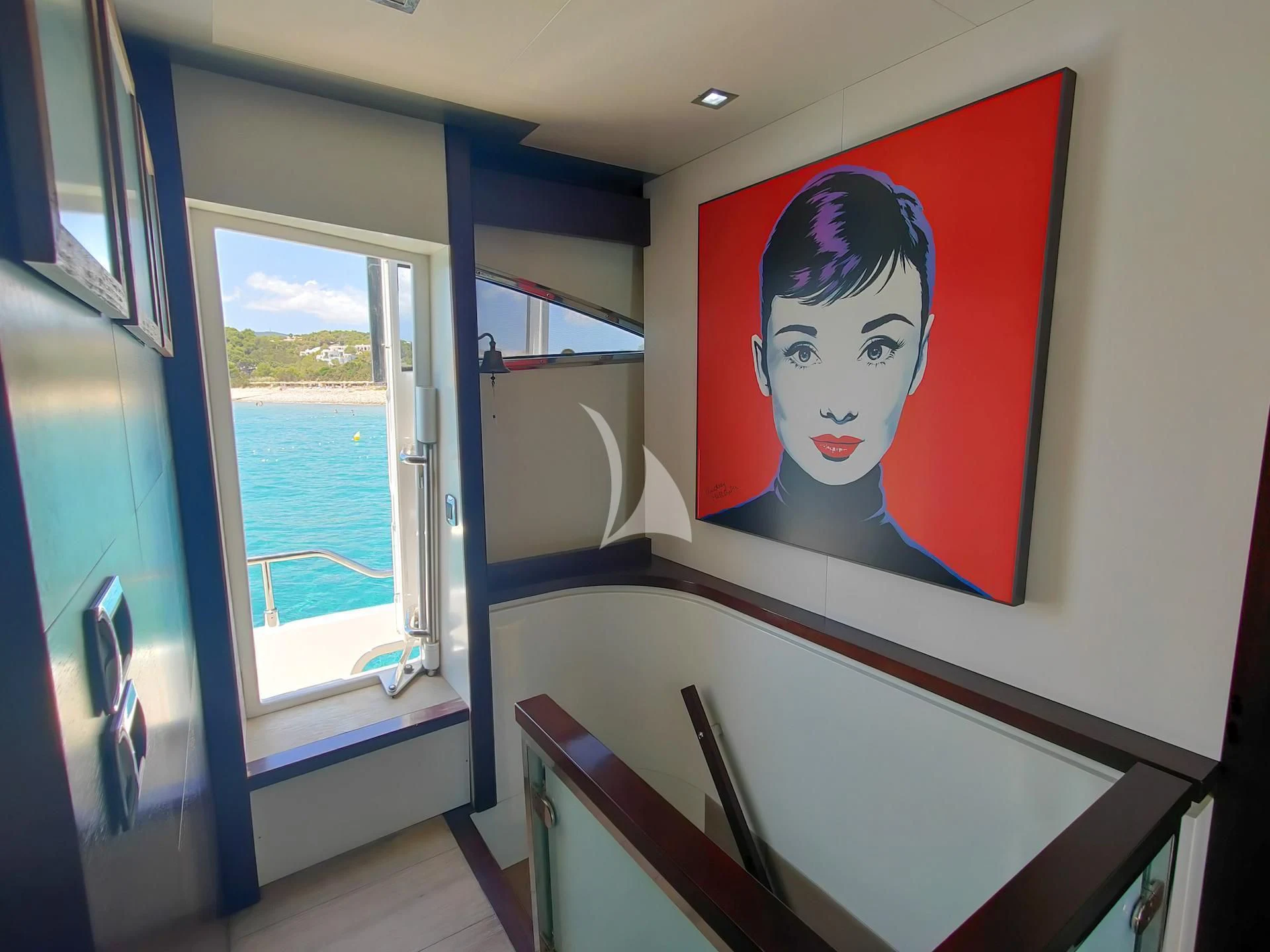 a painting on a wall aboard GEMINIS Yacht for Sale