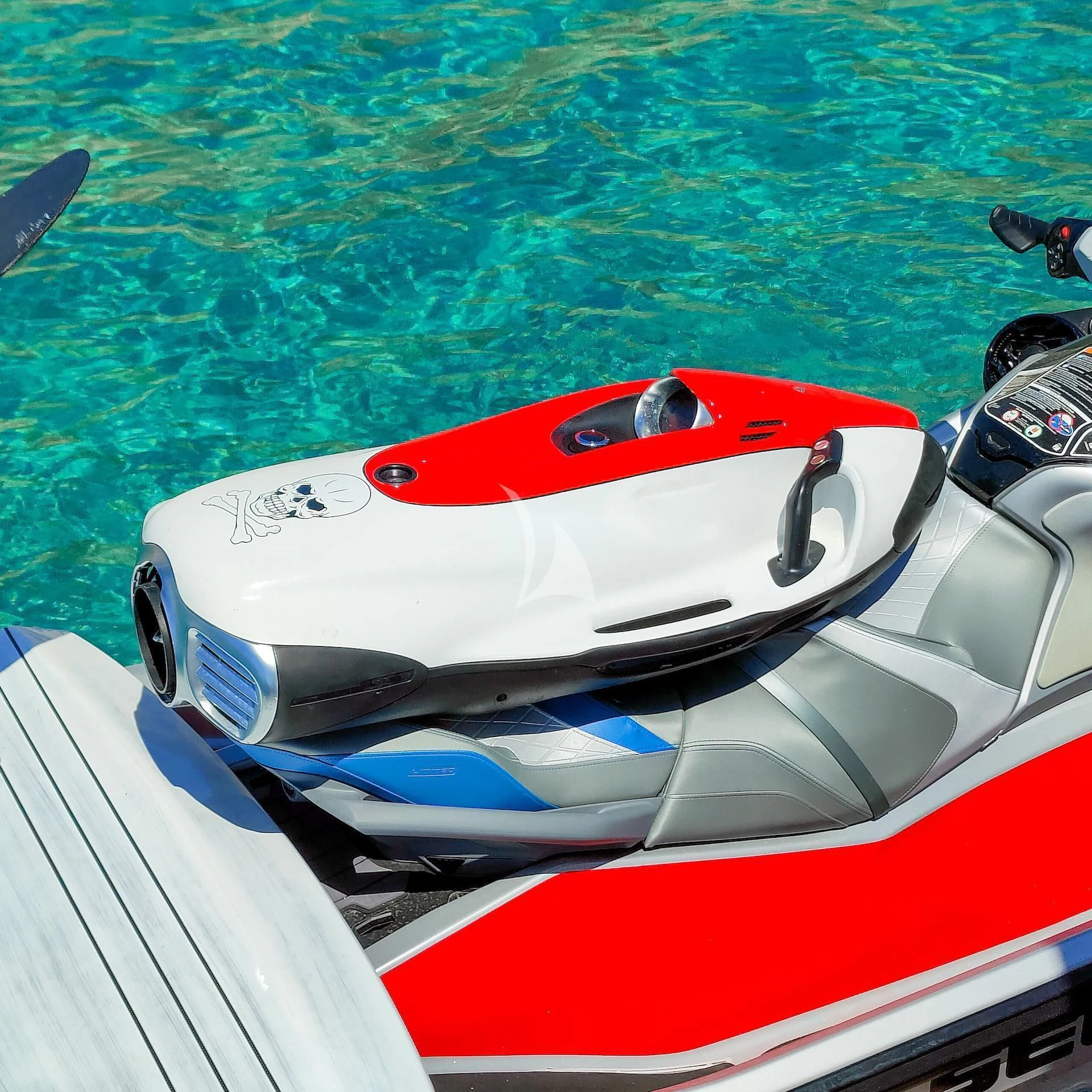 a white and red boat on water aboard GEMINIS Yacht for Sale