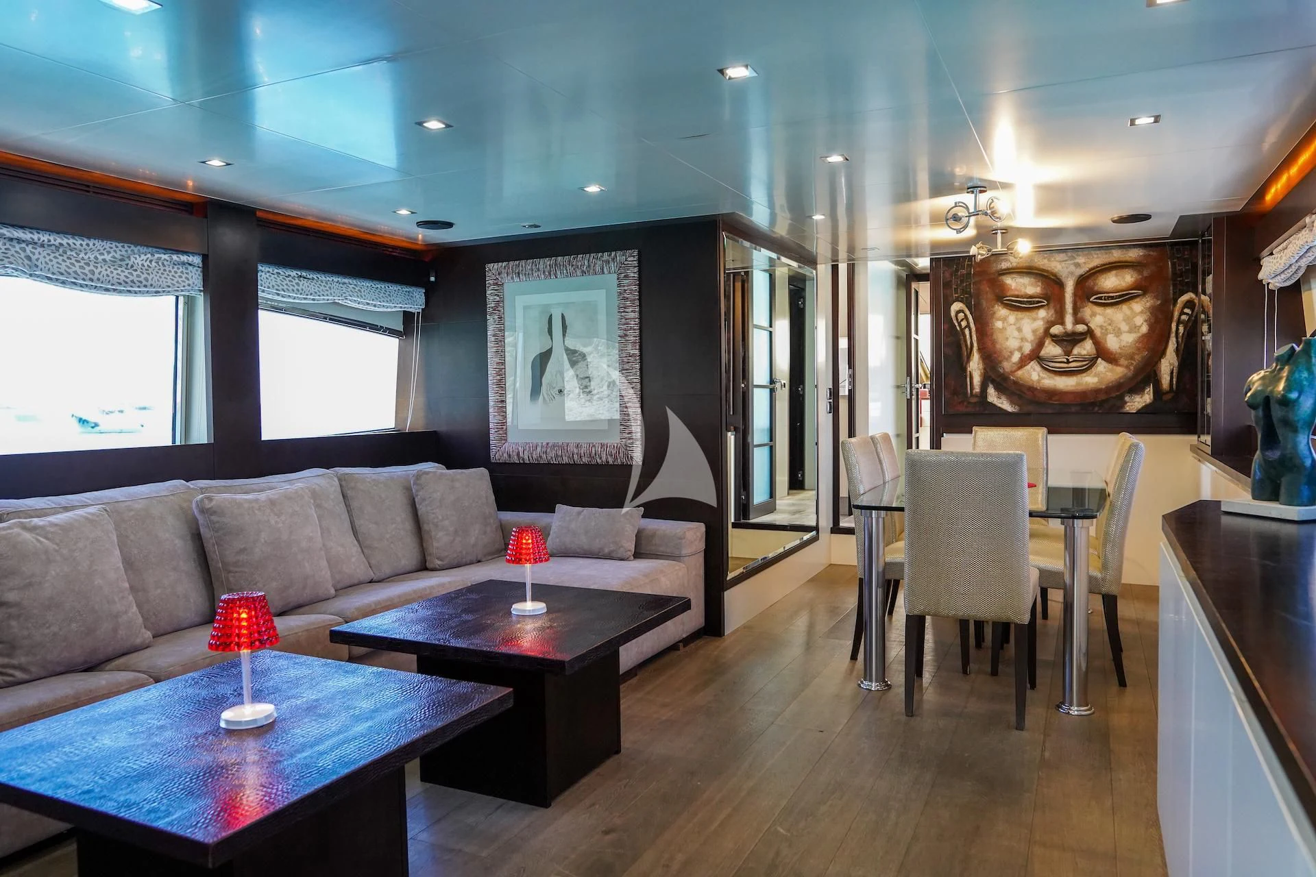 a living room with a couch and a table aboard GEMINIS Yacht for Sale