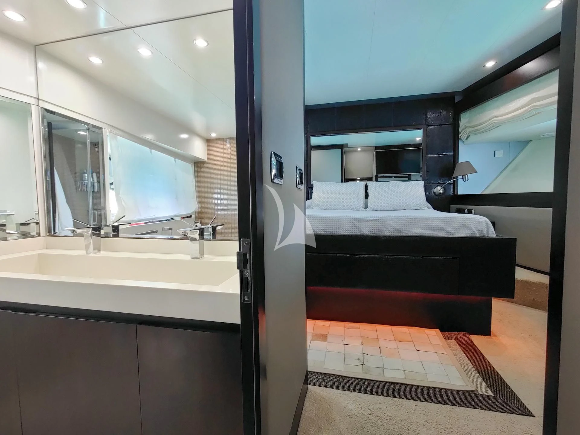 a bathroom with a large mirror aboard GEMINIS Yacht for Sale