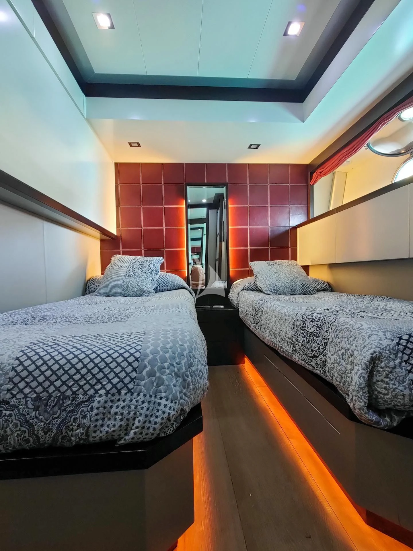 a room with two beds aboard GEMINIS Yacht for Sale