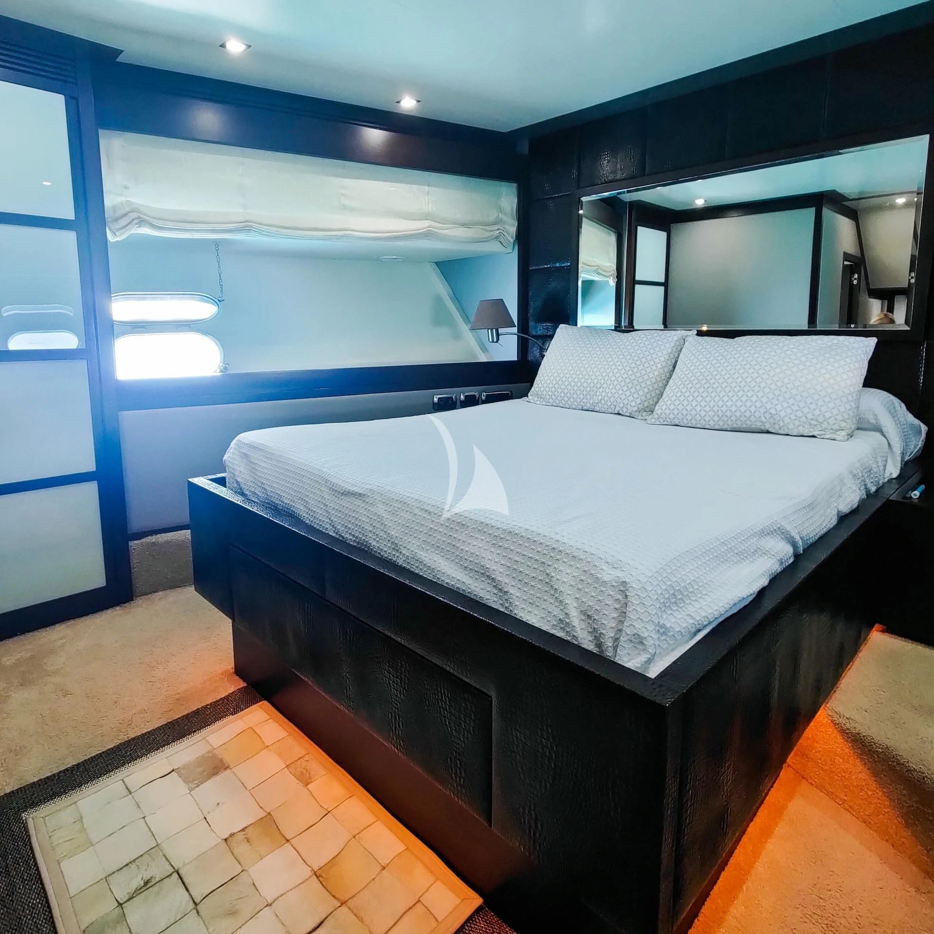 a bed in a room aboard GEMINIS Yacht for Sale
