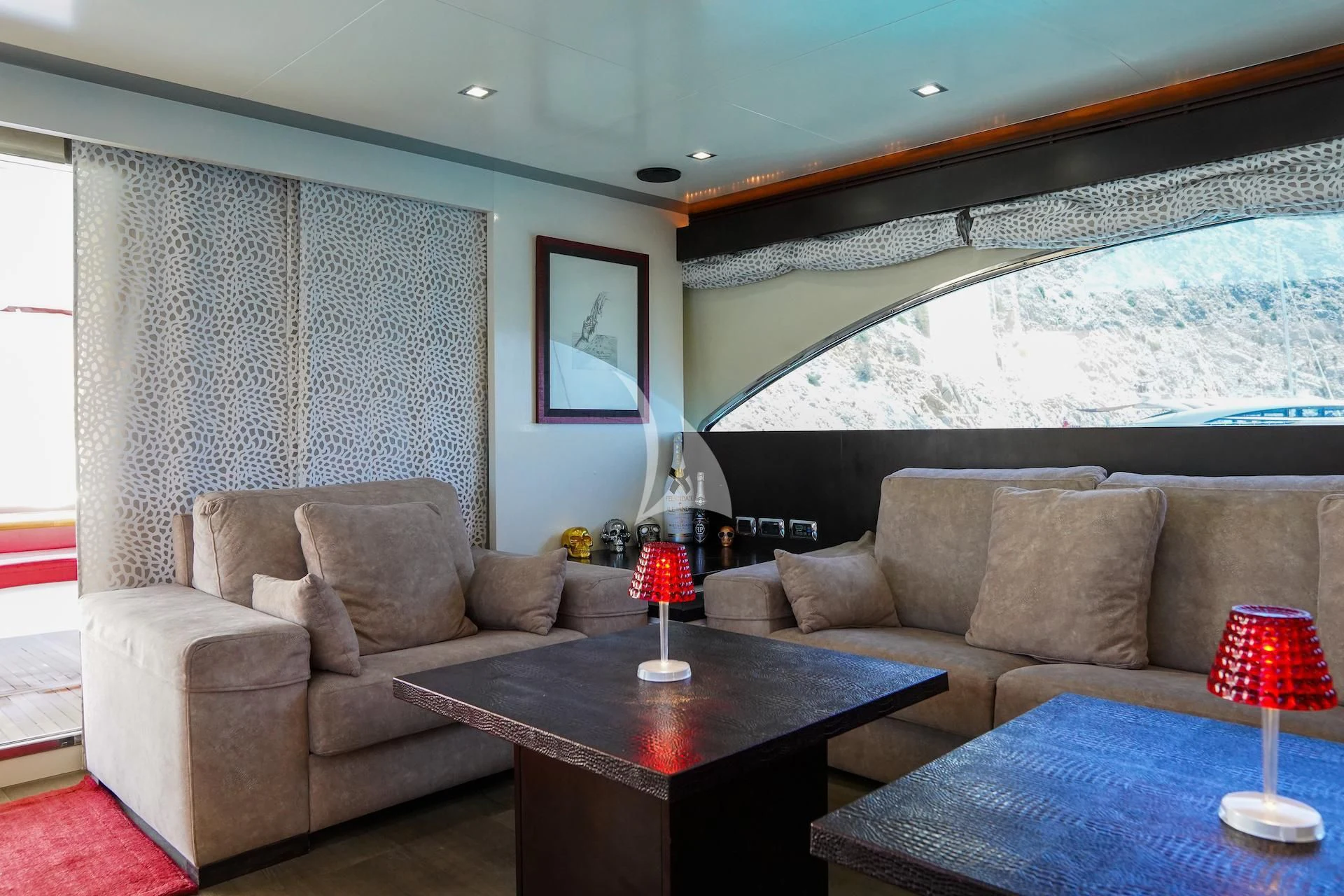 a living room with a couch and a table aboard GEMINIS Yacht for Sale