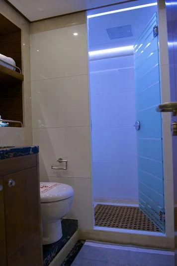 a bathroom with a toilet and a sink aboard SEAHORSE Yacht for Sale