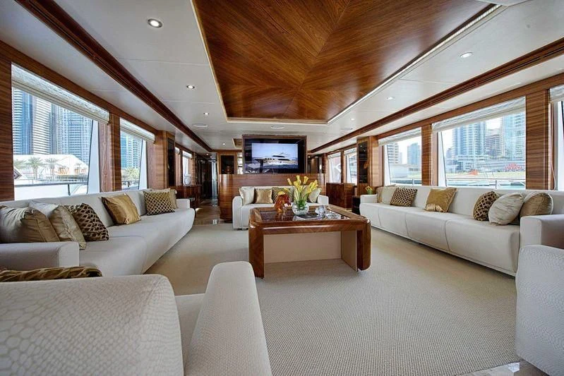a living room with a couch and a television aboard SEAHORSE Yacht for Sale
