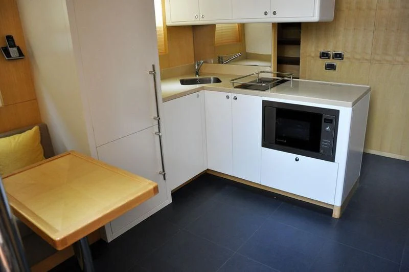 a kitchen with a microwave oven aboard SEAHORSE Yacht for Sale