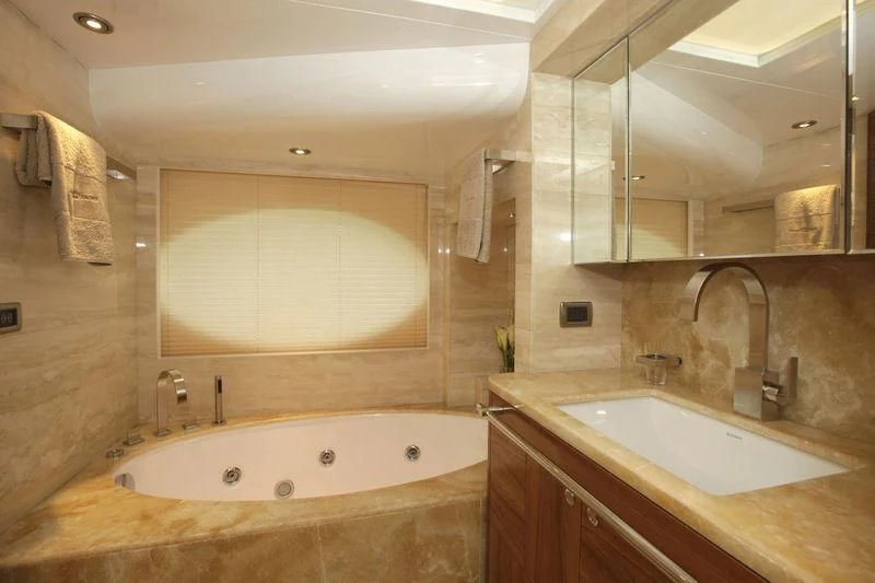 a bathroom with a large mirror aboard SEAHORSE Yacht for Sale