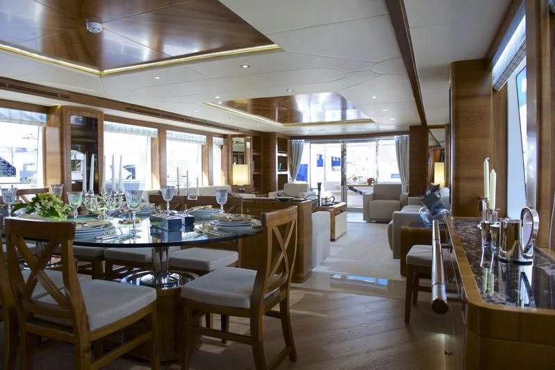 a large dining room with a large table and chairs aboard SEAHORSE Yacht for Sale