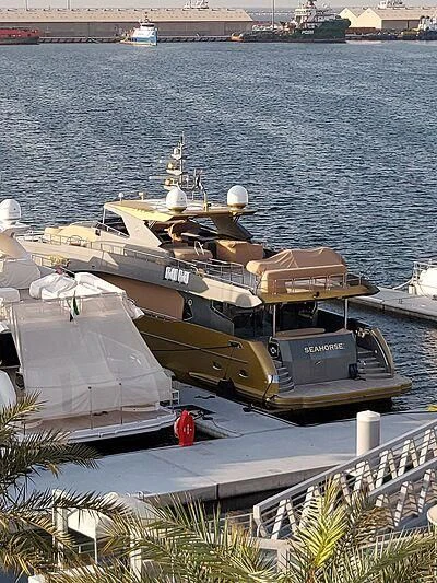 a military ship on a dock aboard SEAHORSE Yacht for Sale