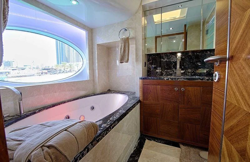 a bathroom with a large bathtub aboard SEAHORSE Yacht for Sale