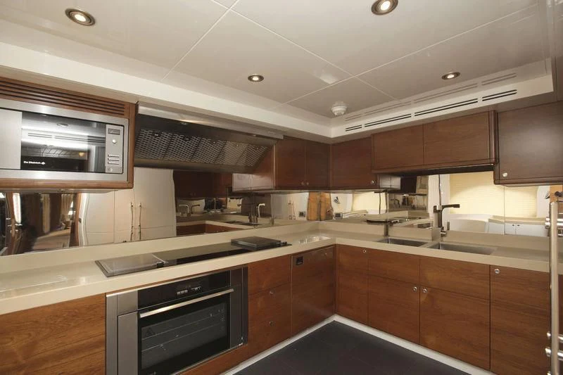 a kitchen with a stove and oven aboard SEAHORSE Yacht for Sale