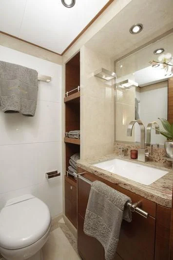 a bathroom with a sink and toilet aboard SEAHORSE Yacht for Sale