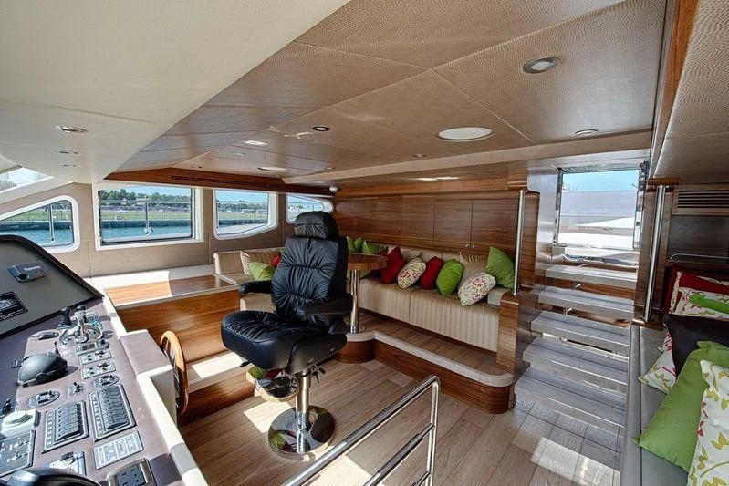 a living room with a couch and a chair aboard SEAHORSE Yacht for Sale