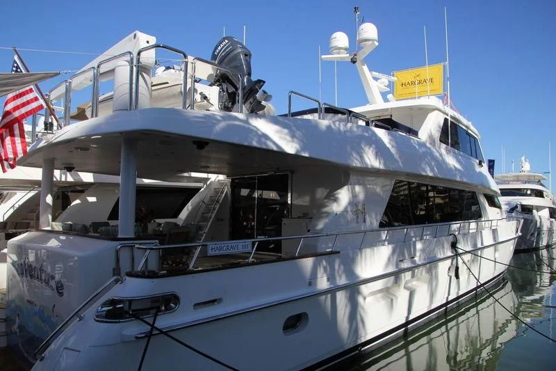 a large white boat aboard DIVERTIMENTO II Yacht for Sale