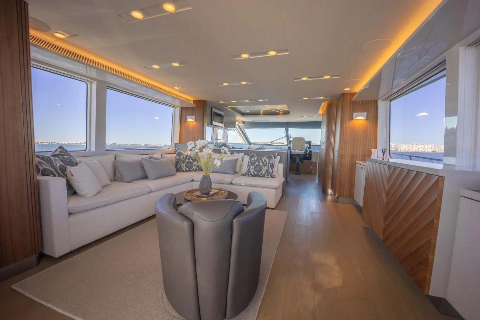 a living room with a couch and a table aboard MY 3 GALS Yacht for Sale