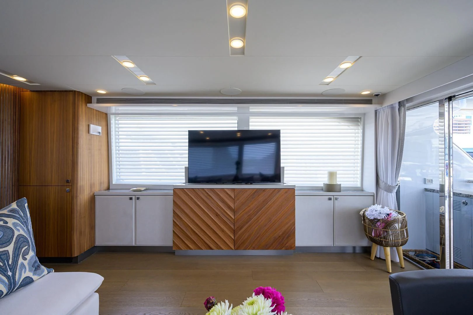 a room with a tv and a couch aboard MY 3 GALS Yacht for Sale