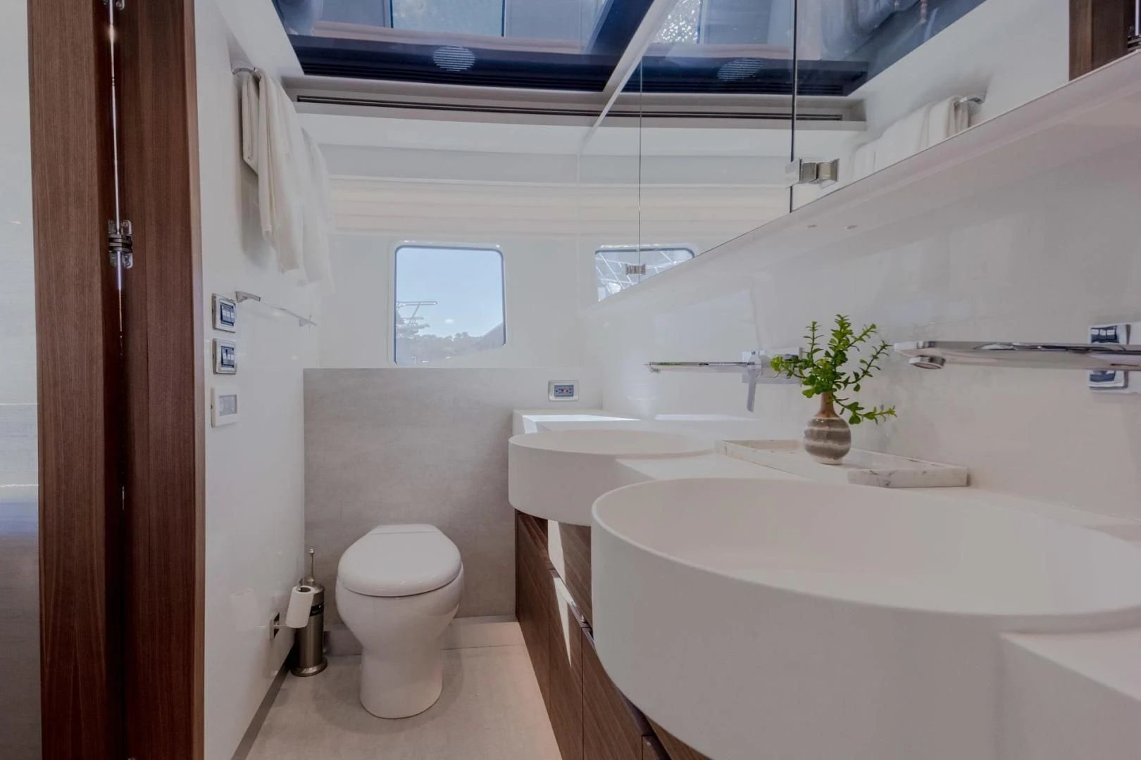 a bathroom with a tub sink and toilet aboard MY 3 GALS Yacht for Sale